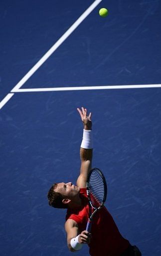 American Michael Russell earned a second-round place as he beat compatriot Jesse Levine 6-3, 6-4